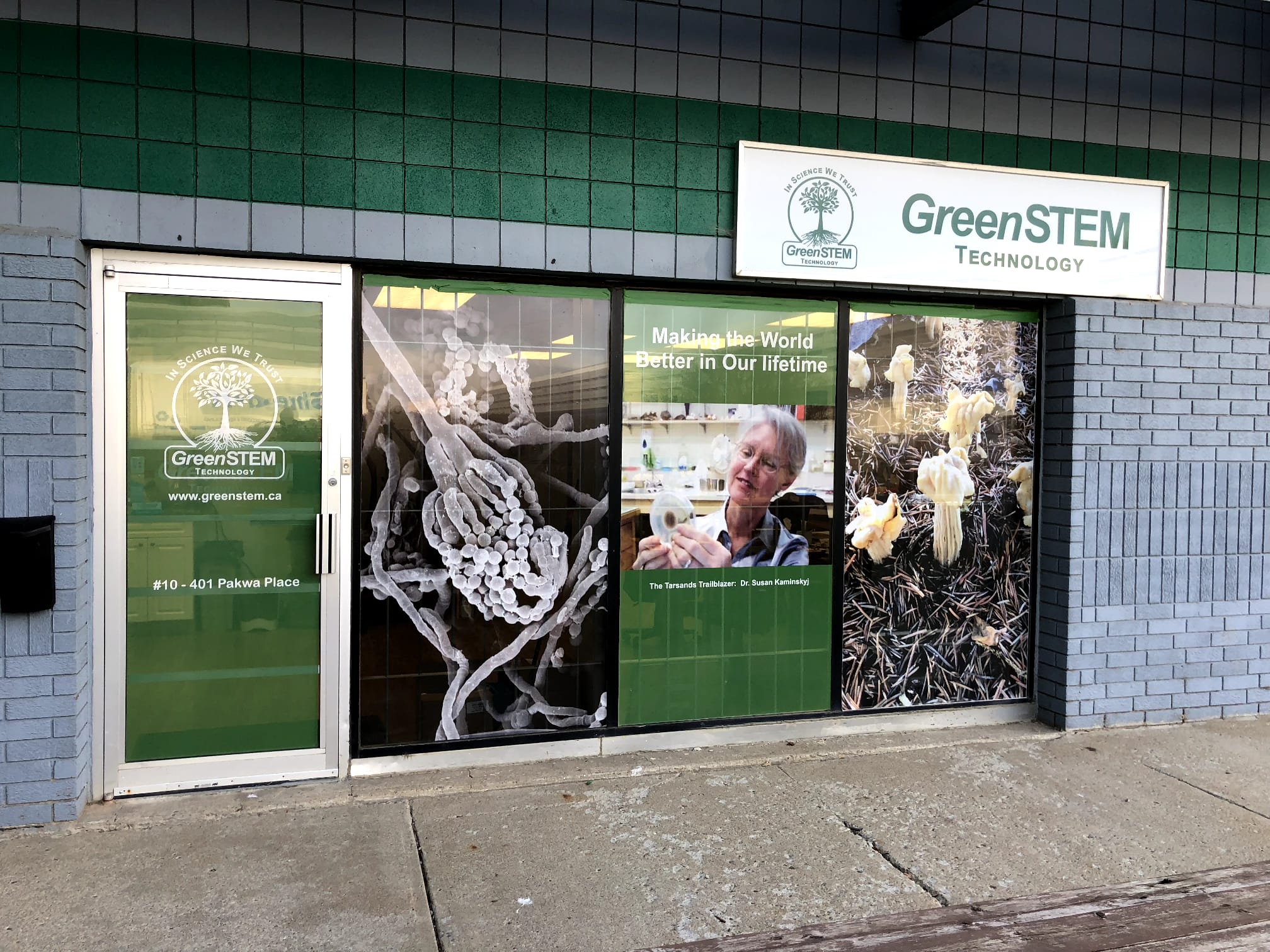 GreenSTEM Technology storefront with graphics.